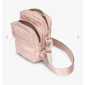 CALPAK Stevyn Mini crossbody bag backpack in pink Color (sand)